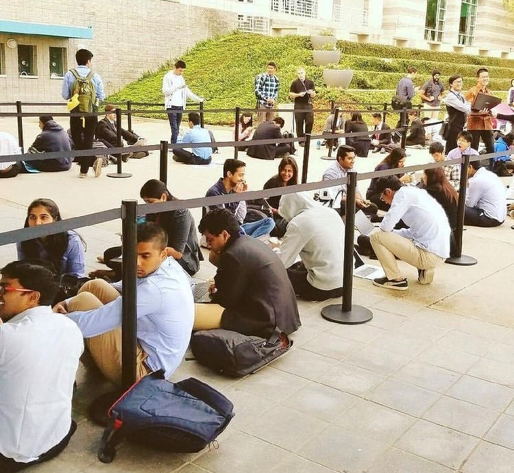 Students waiting in line outside